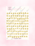 yellow stitched letters  sticker sheet